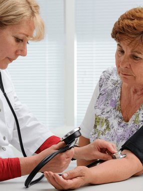 A patient getting her blood monitored at Ashworths Clinic in Ashford, Kent.